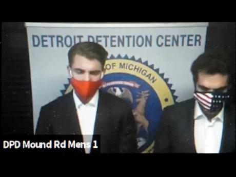 In this image taken from video provided by the 36th District Court in Michigan, Jacob Wohl (left) and Jack Burkman appear during their arraignment via video on Thursday, October 8, 2020, in Detroit. 