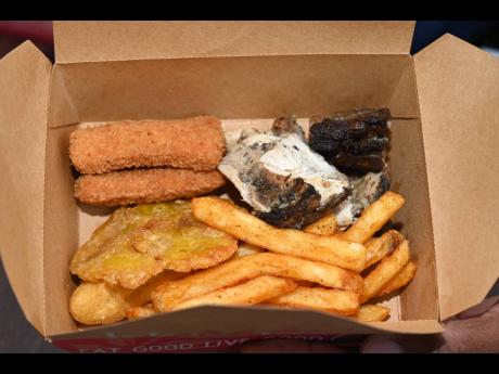 Specially invited guests were able to get a taste of the restaurant’s staples: jerk chicken and breaded fish fillet, served with signature seasoned fries, fried festival and fried green plantain.