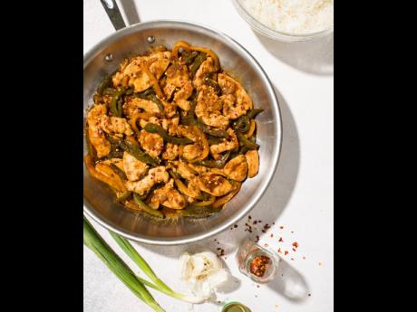 Chicken and bell pepper stir-fry with savory-sweet, umami-rich hoisin sauce.