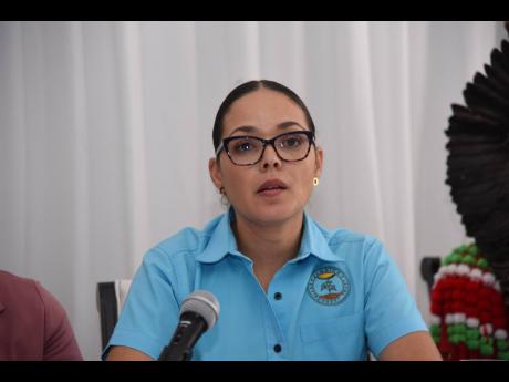 Dr Theresa Rodriguez-Moodie, executive director at the Jamaica Enviornment Trust, gives a statement during the Advocates Network’s civil society post-Budget press conference held yesterday at Spanish Court Hotel in New Kingston. 