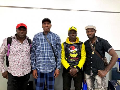 Participants in the Canada Seasonal Agriculture Workers Programme : Derrick Williams, Roy Campbell, Prince Espeut and Winston Davis, who recently arrived in Toronto from Jamaica.