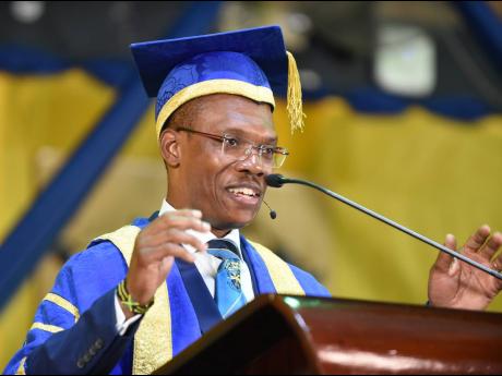 Dr Kevin Brown, the fifth president of The University of Technology, Jamaica, addressing the audience.
