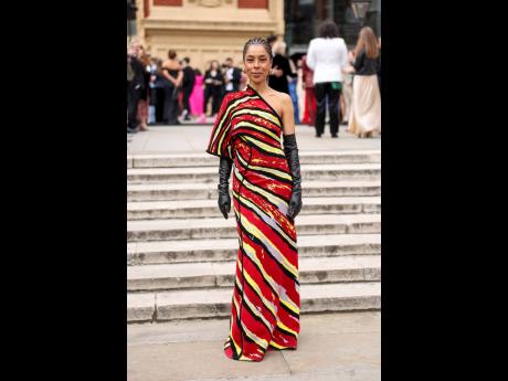 Sophie Okonedo, who was nominated for her starring role in ‘Medea’, looks fresh-faced in cornrows and a multicoloured one-shoulder gown. 