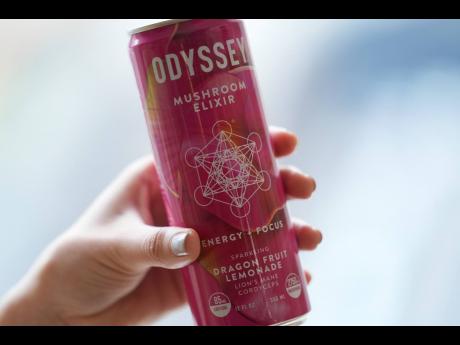 A can of Odyssey mushroom elixir is shown, Wednesday, April 10, 2024, in New York. Hundreds of brands of functional beverages – drinks designed to do more than just taste good or hydrate – are vying for consumers’ attention.