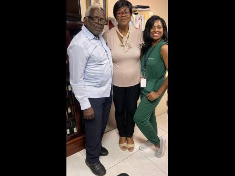 Former clerk to the Houses of Parliament Valrie Curtis soaks up a memorable moment with former speaker Pearnel Charles Sr and his daughter and Member of Parliament for St Thomas Eastern, Dr Michelle Charles. The Charleses visited Curtis days before her ret