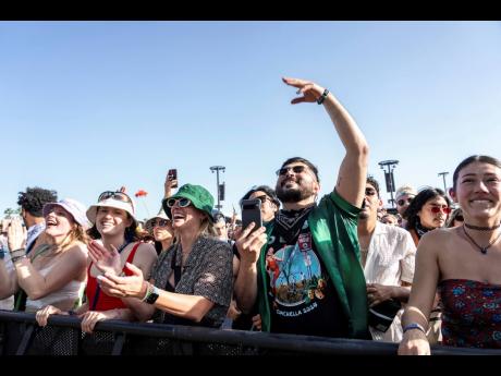 Festivalgoers are seen during the the first weekend of the Coachella Valley Music and Arts Festival at the Empire Polo Club on Saturday, in Indio, California.