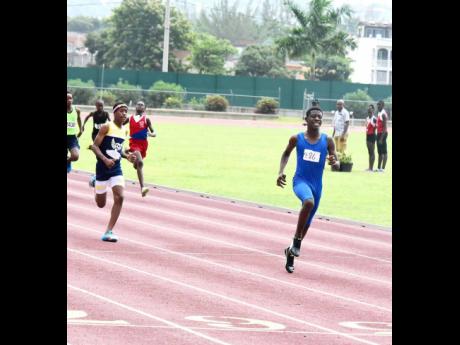 Rackeem Grizzle formerly of Barracks Road Primary school ( left) seen here placing second in the 200 metres final behind Nataniel Gibbs formerly of Corinaldi Primary School at the Western Primary School Championships at the Montego Bay Sports Complex in Ca