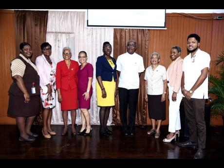 From left: Denise McGowan, final-year secondary mathematics student; Kerry-Ann Ennis Henry, acting research officer; Elogene McEachin, dean of Faculty; Dr Jacqueline Chen, VP of Administrations; Winsome Francis, principal; Rev Fr Kingsley W. Asphall, chapl
