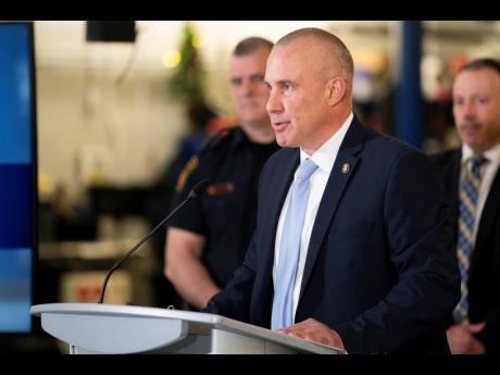 ATF Special Agent in charge, Eric DeGree, speaks to the media at a press conference regarding Project 24K, a joint investigation into the theft of gold from Pearson International Airport, in Brampton, Ontario, on Wednesday, April 17. 