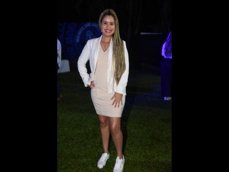 Bianca Fakhourie, corporate affairs and legal specialist at Pepsi Jamaica, went from corporate to casually cool with white low tops.  