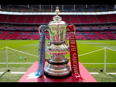  The FA Cup trophy is seen before the English FA Cup final between Manchester City and Manchester United at Wembley Stadium in London, Saturday, June 3, 2023. 