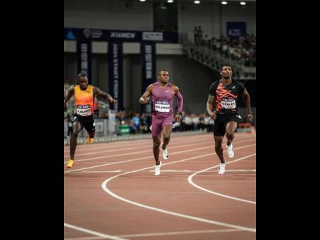 
From left: Jamaica’s Ackeem Blake follows home the United States pair of Cristian Coleman and Fred Kerley during the men’s 100 metres at the Xiamen Diamond League in China yesterday.