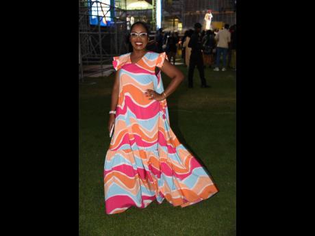 Host, author, and social media influencer Basillia Cuff is dressed to impress in a floor-length maxi. 