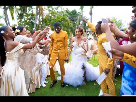 Surrounded by their loved ones, the pair got married at the Caymanas Golf Club in St Catherine.