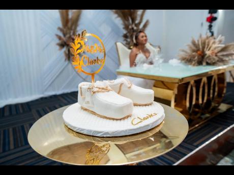 Truly embracing their shared last name, the Clarkes modelled their wedding cake after the famous shoe of the same name.