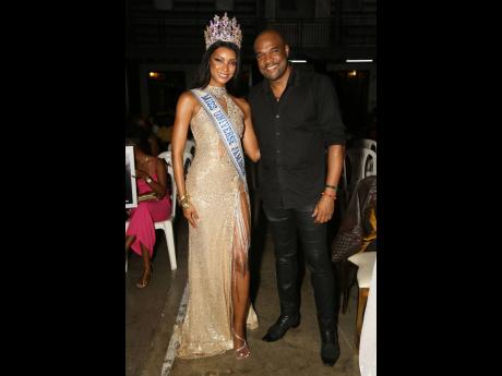 Miss Universe Jamaica 2023 Jordanne Lauren Levy (left) stunned as she posed with Karl Williams, co-franchise holder and national director, Miss Universe Jamaica, who took on the role of chief judge at the Ms Universe Jamaica East pageant.