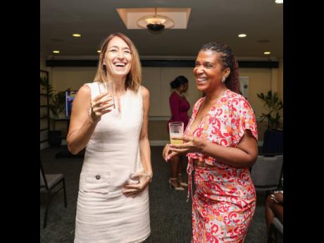 Alanna Kirschner, owner of Swypz Plus, and Racquell Brown, managing director of Irie Rock Natural Skincare line, share a happy moment.