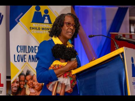 Dr Pauline Mullings announcing her departure as chairman of the National Child Month Committee on Thursday during the launch for Child Month 2024 at the Lecture Hall of the Institute of Jamaica in downtown Kingston.
