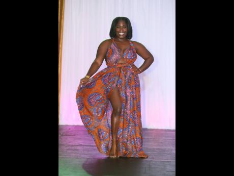 Above:  Manchester-based fashion designer and entrepreneur Tishari Williams of TWORIGINALS, wearing a custom-made Ankara infinity dress made just hours before she hit the runway.