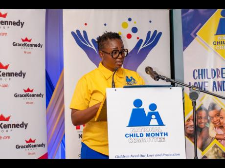 Nicole Patrick Shaw, newly appointed chairperson, National Child Month Committee, during her address inside the Lecture Hall of the Institute of Jamaica in downtown Kingston on Thursday. 