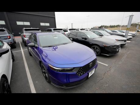 In this April 14, 2023 photo, 2024 Accord sedans are displayed at a Honda dealership in Highlands Ranch, Colorado. The 2024 Accord has automatic emergency braking.