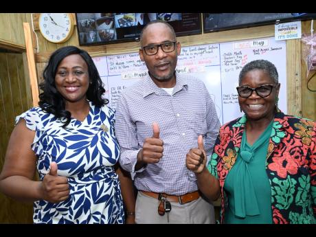 From left: Yvette Ricards Thompson, acting principal of Denham Town High School; Rohan Johnson, acting vice-principal; and Novette Christian, vice-principal, are pleased with the progress being made to transform the west Kingston-based school.