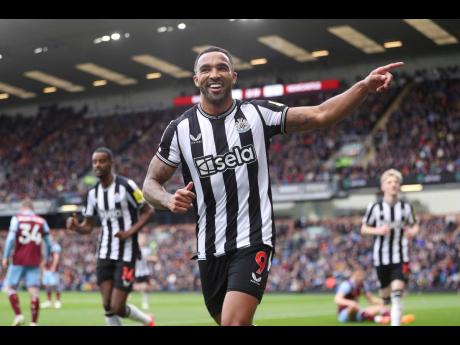 AP 
Newcastle United’s Callum Wilson celebrates scoring the opening goal of the game during the English Premier League football match against Burnley at Turf Moor, in Burnley, England yesterday.
