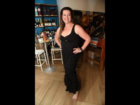 Australian diplomat Jaime Abbott took a bit of Australia with her in a black dress from Sheike, an Australian boutique.