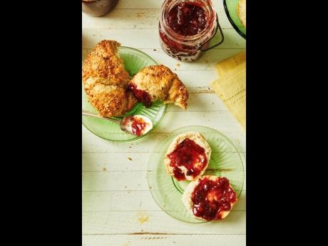 Strawberry jam is spread on delicious pastries.