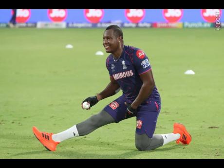 West Indies captain Rovman Powell warms up for the Rajasthan Royals ahead of ther Indian Premier League (IPL) cricket match against the Delhi Capitals yesterday. 