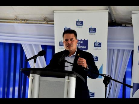 Minister without portfolio in the Ministry of Economic Growth and Job Creation Matthew Samuda speaking during the grand opening of the National Water Commission Falmouth Commercial Office last week.