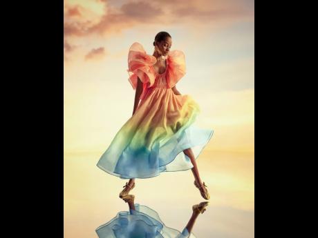 Captured by photographer Charles Dennington and styled by Romy Frydman, Williams is a technicolour beauty in the Oasis frill neck gown.