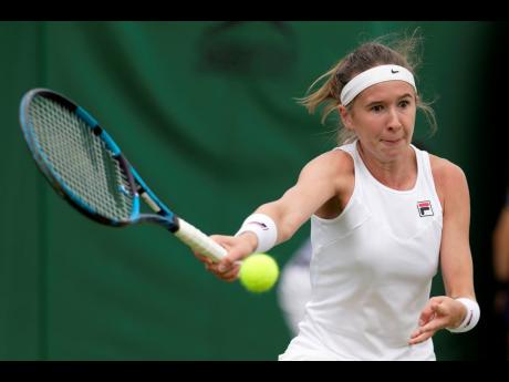 Nikola Bartunkova of the Czech Republic in action against Clervie Ngounoue of the US during the girls’ singles final on day 14 of the Wimbledon tennis championships in London, on July 16, 2023. Wimbledon girls finalist Nikola Bartunkova was provisionally
