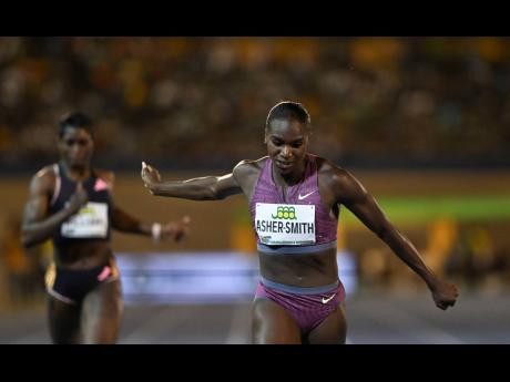 Dina Asher-Smith of Great Britain wins the women’s 200 metres in 22.51 seconds at Saturday’s Jamaica Athletics Invitational meet at the National Stadium.