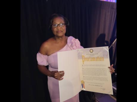 Lady Allen with the  Proclamation from NY Mayor Eric Adams.