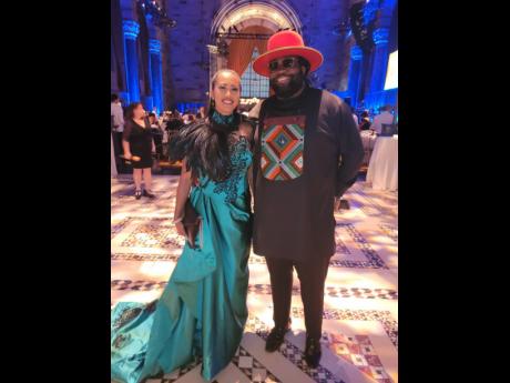  Dr. Annabelle Manalo-Morgan and  Gramps Morgan of Morgan Heritage are all smiles.
