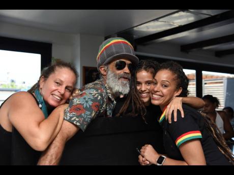 Supporting Kamila on opening day, the McDonalds were out in full force. From left: Dr Kerida McDonald, Errol ‘Chakula’ McDonald, and Kadiya McDonald.