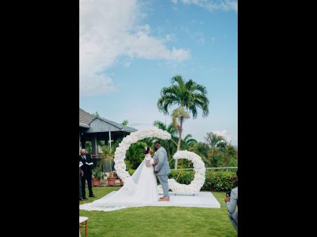 Marking the sixth anniversary of their meeting Candace (left) and Eric were wed at the Caymanas Golf Club in St Catherine. 