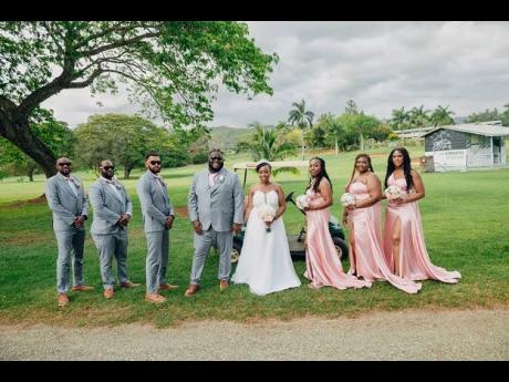 Standing beside the Charleses on their special day were (from left) Morais Hogarth, Ian Williams, best man Andre Morris, matron of honour Christon Clarke-Hylton, Felisha Doemam and Janelle Patterson.