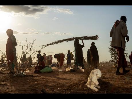 Somalis, who have been displaced due to drought, settle at a camp on the outskirts of Dollow September 19, 2022. The world is falling well short of the progress needed to meet the United Nations’ sustainable development goals by 2030 in areas ranging fro