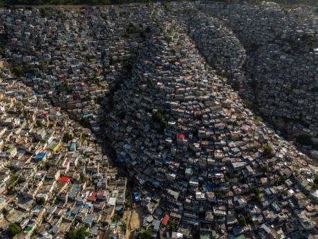 Houses sit on the slopes of the Jalousie neighbourhood in Port-au-Prince, Haiti, on Monday, May 13.