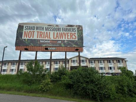 
A billboard supporting legislation that would provide legal protection to manufacturers of pesticides such as Bayer’s popular weedkiller Roundup, is shown in Jefferson City, Missouri, on May 13, 2024.