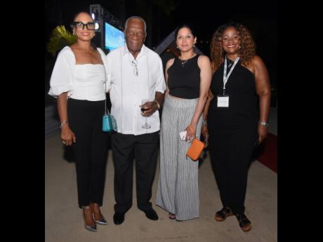 Gathering for a group photo are (from left) Odette Dyer, regional director, Jamaica Tourist Board, and her husband Godfrey, chairman of Tourism Enhancement Fund; Indira Tarachandra, senior assistant to the regional director Canada, Jamaica Tourist Board; a