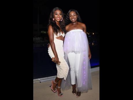 Looking fabulous in all white are Tashawna Hollinzed (left), entertainment supervisor at Royalton Hideaway, and Venesa Blake, entertainment manager.