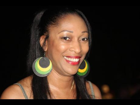 Below: Cherrie Osborne from Antigua sticks to the theme by way of her earrings.