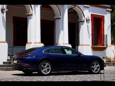 The elegantly curved silhouette of the 2024 Porsche Panamera creates a harmonious blend of sportiness and luxury.