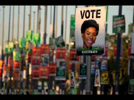 
An election poster of independent candidate Anele Mda is displayed on a pole in Pretoria, South Africa, Thursday, May 16, 2024.