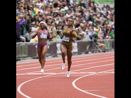 
Sha’Carri Richardson (right) looks determined as she comes through the line in the 100 metres at the Eugene Diamond League yesterday. Côte d’Ivoire’s Marie-Josée Ta Lou-Smith, who finished sixth, is also pictured.