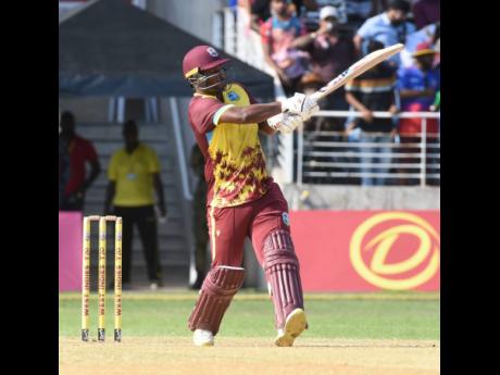 West Indies opener Johnson Charles pulls off the front foot on his way to 69 in the final T20 International of a three-match series against South Africa at Sabina Park yesterday.