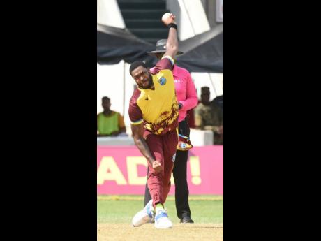 West Indies fast bowler Obed McCoy bowls in the final game of three-match T20 International series against South Africa at Sabina Park yesterday.